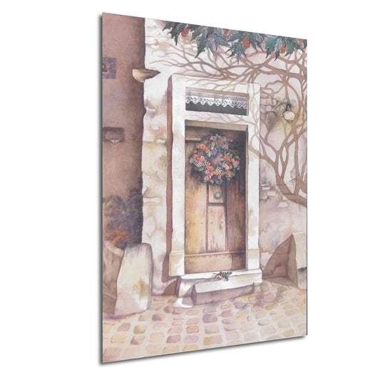a quaint, old-fashioned wooden door with a wreath hanging above it, set in a stone wall.